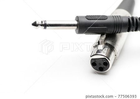 Audio cable with XLR and TRS jack connectors for microphones and professional audio equipment on a white background Audio cable with XLR and TRS jack connectors for microphones and professional audio equipment on a white background 77506393