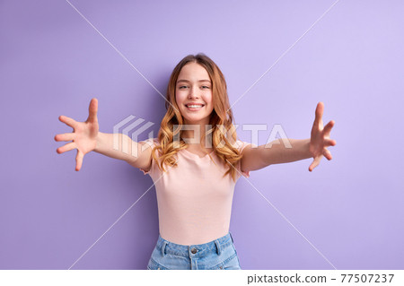 Nice Caucasian Teen Girl Spreading Arms, Going To Hug Nice Caucasian Teen Girl Spreading Arms, Going To Hug 77507237