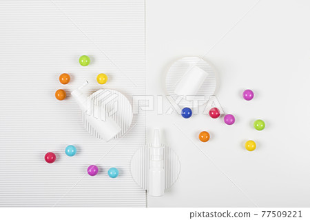 Medicine packing on the white corrugated paper background. Medicine packing on the white corrugated paper background. 77509221