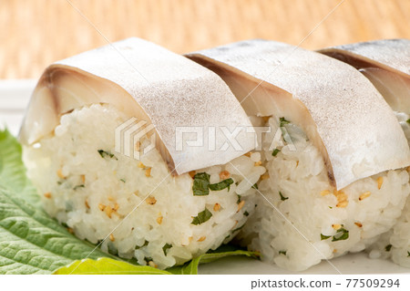 Mackerel stick sushi. 77509294