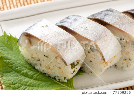Mackerel stick sushi. 77509296
