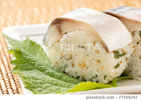 Mackerel stick sushi. 77509297