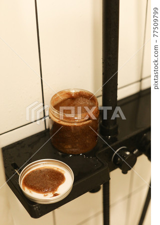 Body scrub of honey sugar peeling. Neutral Background. Body scrub of honey sugar peeling. Neutral Background. 77509799