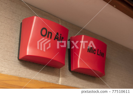 On air sign above broadcasting room door 77510611