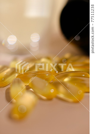 omega fish oil dietary supplements on neutral background 77511238