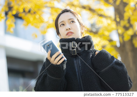 Woman in coat Woman in coat 77513327
