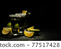 Mexican Gold Tequila with lime slices and salt. 77517428