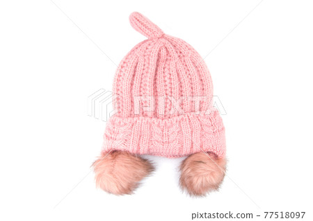 Pink wool knitted hat isolated on white background. Pink wool knitted hat isolated on white background. 77518097