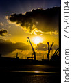 Sunset and crane 77520104
