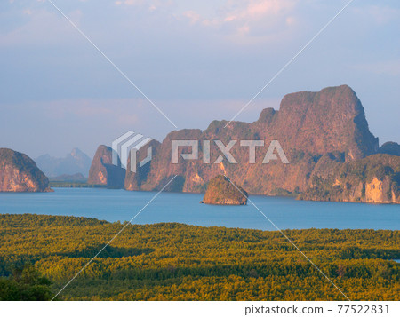 Tropical jungle and rocky islets towering over the bay (Phang Nga Province, Kingdom of Thailand) 77522831