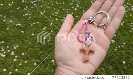 tau cross hand natural background garden daisies tau cross hand natural background garden daisies 77523282