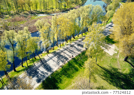 Car moving on the road in europe small town, aerial view Car moving on the road in europe small town, aerial view 77524812