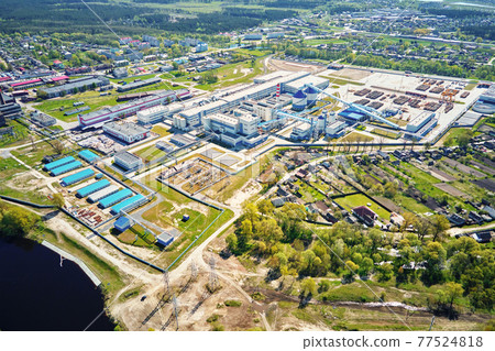 Aerial view of modern paper factory in the city Aerial view of modern paper factory in the city 77524818