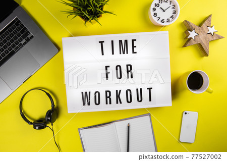 Lightbox text TIME FOR WORKOUT on workspace, daily training, relaxing exercise Lightbox text TIME FOR WORKOUT on workspace, daily training, relaxing exercise 77527002