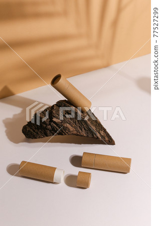 Zero Waste Lipstick packaging. Lip balm tube made of paper. Blank label mock up. Copy space for text Zero Waste Lipstick packaging. Lip balm tube made of paper. Blank label mock up. Copy space for text 77527299