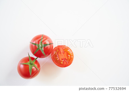 Mini tomato fruit with white background Mini tomato fruit with white background 77532694