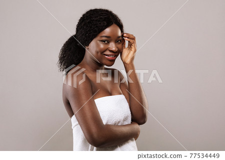 Natural Beauty. Portrait Of Young Smiling Black Female Wearing Bath Towel 77534449