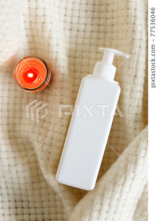 White Plastic dispenser bottles with body cream White Plastic dispenser bottles with body cream 77536046