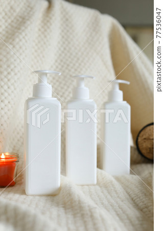 Eco friendly Bottle and tube with natural skincare cosmetics, creams or oils on light background. Plant-based beauty products Eco friendly Bottle and tube with natural skincare cosmetics, creams or oils on light background. Plant-based beauty products 77536047