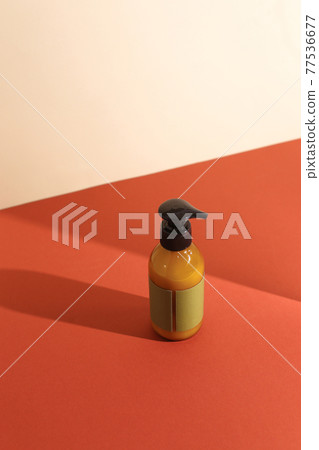 Beauty natural skincare products development concept. Dermatologist cosmetic skincare bottle with pump dispenser and organic ingredient on neutral background. Beauty natural skincare products development concept. Dermatologist cosmetic skincare bottle with pump dispenser and organic ingredient on neutral background. 77536677