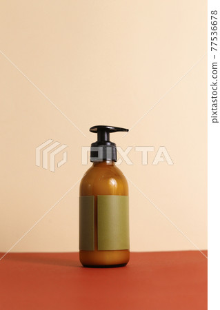 Beauty natural skincare products development concept. Dermatologist cosmetic skincare bottle with pump dispenser and organic ingredient on neutral background. 77536678