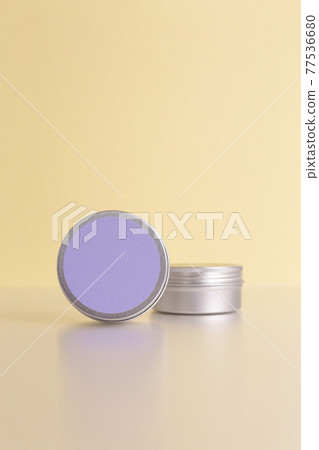 Aluminum round jar for cosmetics. Metalic cosmetic bottles. Blank mock up advertising container with copy space. Aluminum round jar for cosmetics. Metalic cosmetic bottles. Blank mock up advertising container with copy space. 77536680