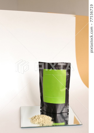 Blank cosmetic products on neutral background. Green Place for your text. 77536719