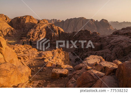 View from Mount Sinai at sunrise. Beautiful mountain landscape in Egypt. View from Mount Sinai at sunrise. Beautiful mountain landscape in Egypt. 77538232