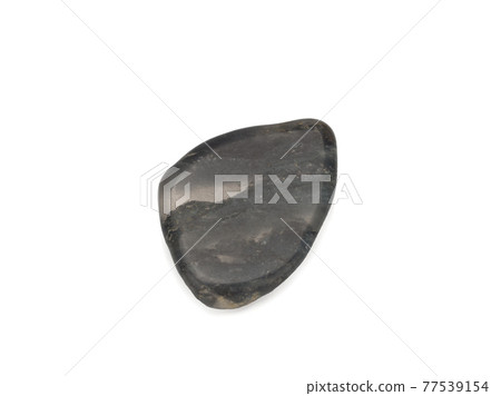 macro shooting of natural stone - black quartz mineral gem stone isolated on white background 77539154