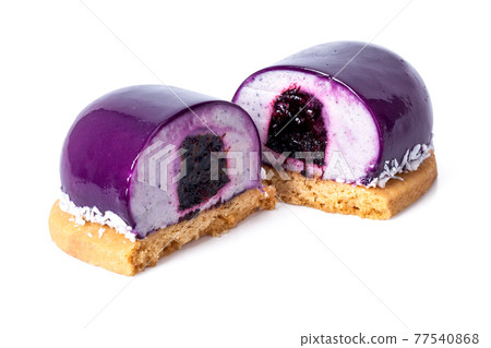 Purple dessert with cocos, and blueberry jam 77540868