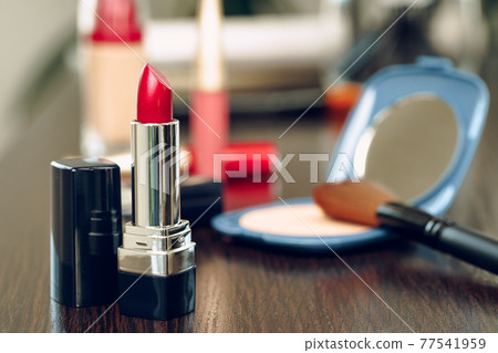 Make up products on vanity table close up Make up products on vanity table close up 77541959