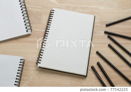 blank spiral notebook with pencil on wooden table for mockup blank template blank spiral notebook with pencil on wooden table for mockup blank template 77542225