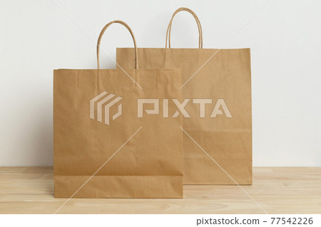 two brown paper bag on wooden table for mockup blank template two brown paper bag on wooden table for mockup blank template 77542226
