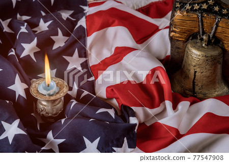 American flag on Memorial day honor respect patriotic military US in Candle memory and Remember bell 77547908