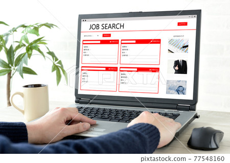 At hand of a man looking for a job on the Internet At hand of a man looking for a job on the Internet 77548160