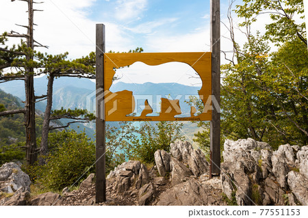 Bear sign at Tara National Park, Serbia. Viewpoint Banjska Stena 77551153