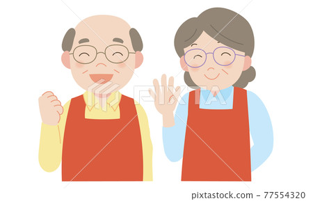 Two senior men and women wearing aprons Two senior men and women wearing aprons 77554320