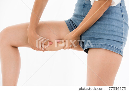 Thigh cellulite Thigh cellulite 77556275