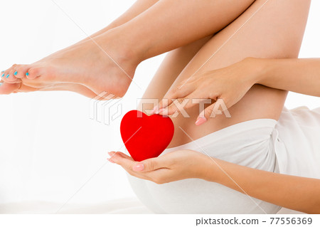 Woman with heart 77556369