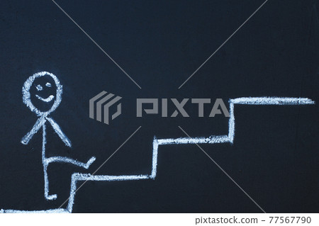 drawn man on the chalk board climbs up step by step to the top of career stairs. copy space drawn man on the chalk board climbs up step by step to the top of career stairs. copy space 77567790