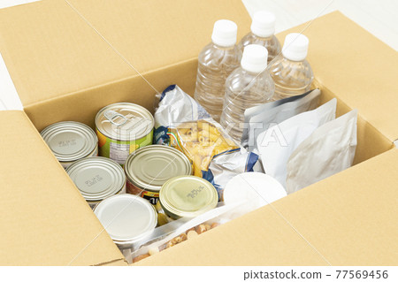 Emergency food stored in cardboard Emergency food stored in cardboard 77569456