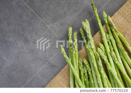 Asparagus green on black background close up , 77570220
