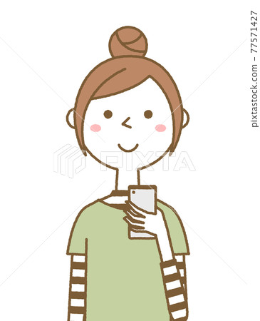 A young woman mom who operates a smartphone A young woman mom who operates a smartphone 77571427