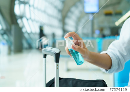 Disinfectant sprayers and germs that adhere on objects on the surface. prevent infection Covid 19 viruses or coronavirus And various pathogens. concept healthcare system ,stay safe and hand sanitizer. 77574139