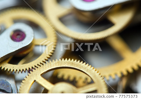 Background with metal cogwheels clockwork. Conceptual photo for your successful business design. Macro. Background with metal cogwheels clockwork. Conceptual photo for your successful business design. Macro. 77575373