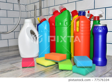 Detergent bottles, sponge for washing and detergent spray cleaner. Household for cleaning 77576104