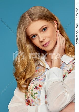 young blonde curly woman with natural makeup young blonde curly woman with natural makeup 77576458