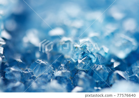 Beautiful texture of Blue crystals. mineral its blurred natural background. Winter Beautiful background. Macro Beautiful texture of Blue crystals. mineral its blurred natural background. Winter Beautiful background. Macro 77576640