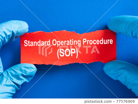 Doctor hand with word Standard Operating Procedure (SOP). Coronavirus Medical Concept. Doctor hand with word Standard Operating Procedure (SOP). Coronavirus Medical Concept. 77576909