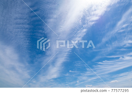 Streak clouds and wavy clouds spreading in the blue sky a-1 Streak clouds and wavy clouds spreading in the blue sky a-1 77577295